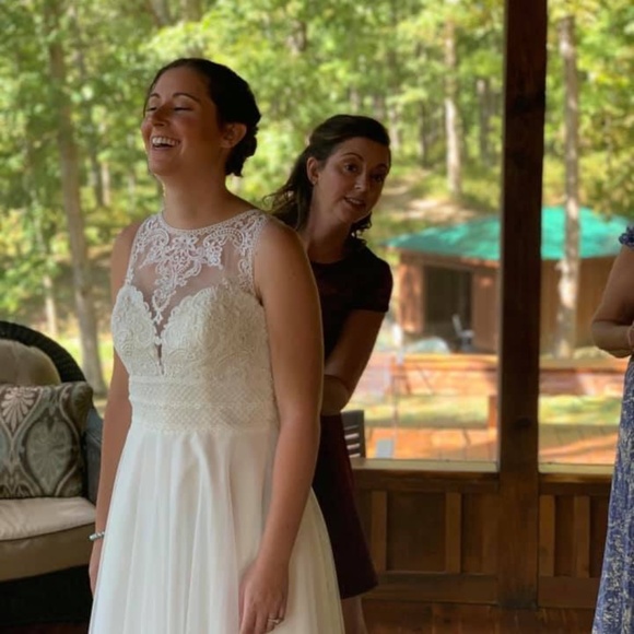 Beautiful Lace and Tulle Sleeveless A-Line Wedding Dress  Voyage Bridal Collecti - Picture 5 of 11